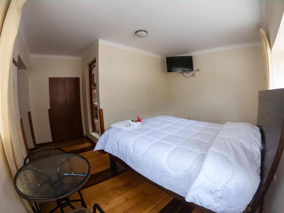 Hotel Los Laureles Calca Buitenkant foto